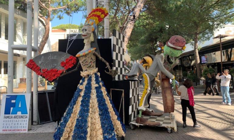 Colorful street sculptures, Dia de los Muertos theme.